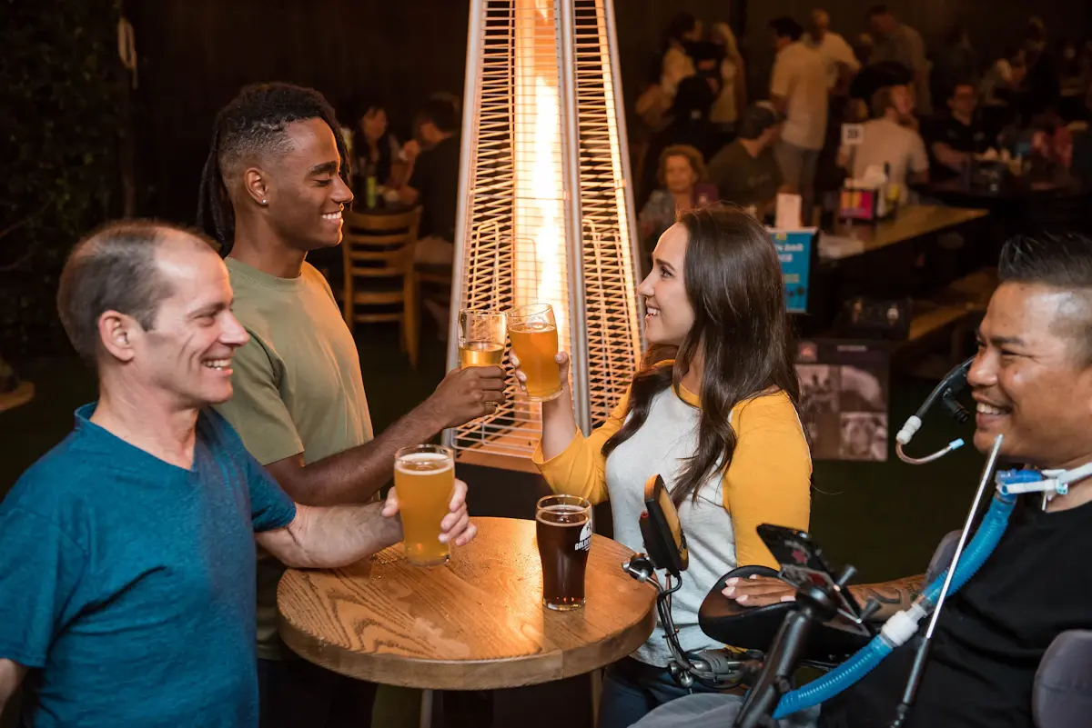 Guests spending time together at a busy bar