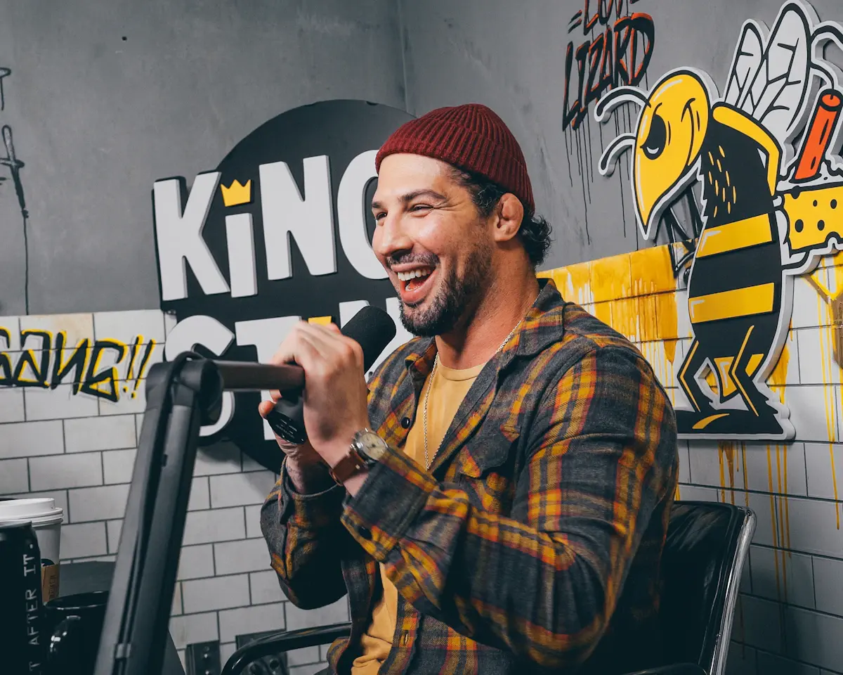 A comedian speaking into a microphone